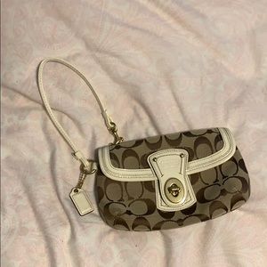 Coach wristlet with front pocket